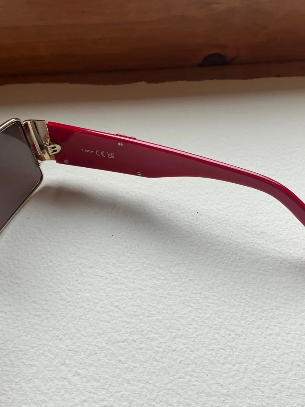 MCM Red and Gold Shield Sunglasses with crossbody case